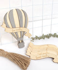 Wooden Hot Air Balloon Monthly Milestone Cards For Babies, My First Year Sign set on white background with greenery
