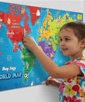 Child placing reusable sticker on Mapology World Map With Reusable Stickers For Kids Ages Five To Twelve Hands On Interactive Wall Map Learning Game That Makes Geography Fun With 100 Plus Reusable Stickers STEM Toy Gift For Boys And Girls