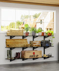 Garage Must Have 3 Tier Wall Shelving System For Heavy Duty Storage installed with various items, black shelves