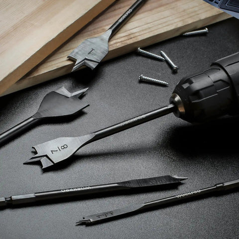 Pro Grade Spade Drill Bit Set For Woodworking, 10-Piece With Black Coating And High Carbon Steel Paddle Bits on black surface