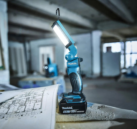 18V LXT Cordless 12 LED Flashlight with Foldable Head and 360-Degree Swivel Hook shown on worksite
