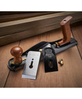 Low Angle Jack Plane, Sweetheart No 64 Style on wood surface, highlighting beefy ductile iron castings and precise adjustment features.