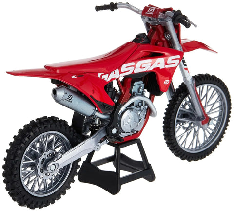 GasGas MC 450F One Twelfth Scale Diecast Motorcycle Model in red with real rubber tires and rolling wheels on a stand.