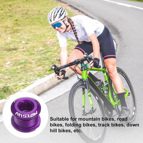 Cyclist riding road bike with 5 Pack M8 Aluminum Alloy Single Chain Ring Bolts For Bicycle Crankset Nuts, purple finish shown