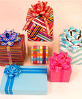 Gift boxes decorated with blurred lines washi tape and bows, showcasing Decorative Washi Tape for Planners and Crafts, Blurred Lines Pattern, 6-Roll Pack, 0.59 in x 393 in Each, Removable Adhesive for Journals, Gift Wrap, Labeling, DIY Projects.