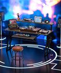 Music Studio Desk Production Workstation With Built In Power Outlet And USB Hub For Recording And Home Studio Use Studio Table For Beat Makers And Producers Grey Oak Finish in vibrant studio setup