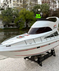 Massive 27.5 Inch RC Cruise Ship Boat With Dual 380 High Speed Motors Beast Hull Remote Control Yacht on display outdoors