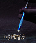 Three Piece Pro Grade Jewelry Ball Grabber Tool Set With Four Prong Precision Pickup lifting a diamond