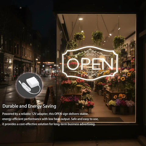 Lit Neon Open Sign For Business With Dimmable LED Warm White Glow, 16.5 By 10.5 Inch, Includes 12V 2A Adapter, Bright Visibility For Windows Walls Bars Cafes Salons Stores, Eye Catching Open Sign That Lights Up Front Window, displayed in a cozy flower shop window.