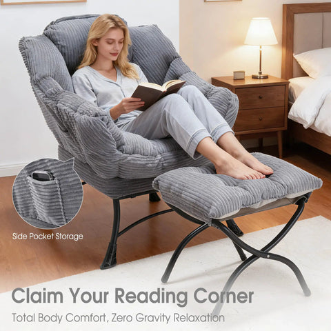 Woman sitting on Cozy Lazy Chair With Ottoman For Chillin And Reading, lounge seat in gray, next to bedside table.