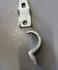 Straight Shooter Clamp Back Spacer And Strap Kit For 2 Inch Electrical Conduit, metal hardware components displayed on a gray surface.