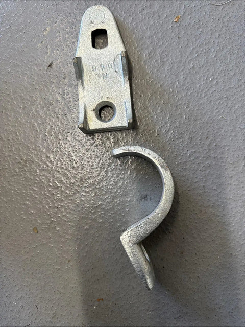 Straight Shooter Clamp Back Spacer And Strap Kit For 2 Inch Electrical Conduit, metal hardware components displayed on a gray surface.