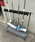 Must-Have All In One Cleaning Tool Cart and Organizer with mop and broom holder on grey base, wall-mounted indoors