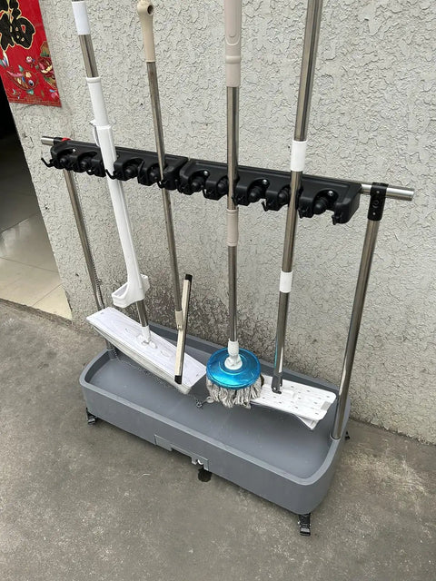 Must-Have All In One Cleaning Tool Cart and Organizer with mop and broom holder on grey base, wall-mounted indoors