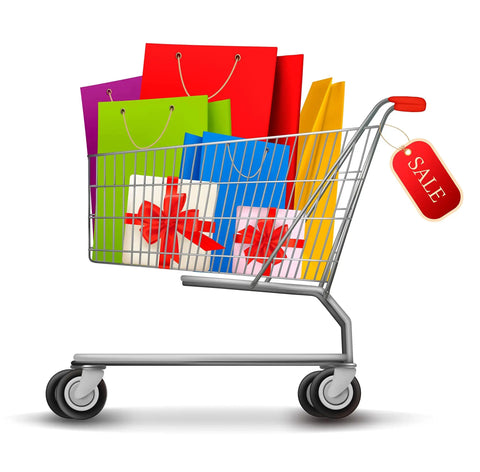 Shopping cart with colorful gift bags and sale tag