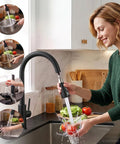 Commercial Grade Kitchen Workstation Faucet with with Glass Rinser & LED in use, showcasing high-arc design and pull-down sprayer.