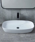 Modern bathroom with 28x15 Inch Oval Porcelain Vessel Sink White Ceramic Above Counter Bathroom Basin for vanity