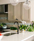 Modern kitchen with Boss Black And Gold Kitchen Faucet With Pull Down Magnetic Docking Sprayer, high arc spout, deck mounted.