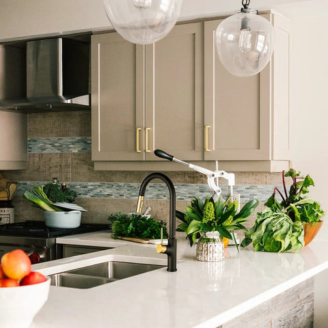 Modern kitchen with Boss Black And Gold Kitchen Faucet With Pull Down Magnetic Docking Sprayer, high arc spout, deck mounted.