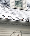 Electric Roof Heating Cable Kit RC120 120V 600W 120 Ft Black For Ice Dam Prevention installed on snowy roof gutter