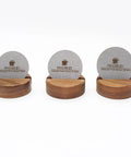Three 58 Point 5 Millimeter Puck Screens With Wood Stands For Espresso Machines, showcasing 316L Stainless Steel Filter