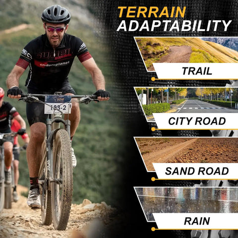 Cyclist riding mountain bike on rocky trail, demonstrating terrain adaptability including trail, city road, sand road, and rain.