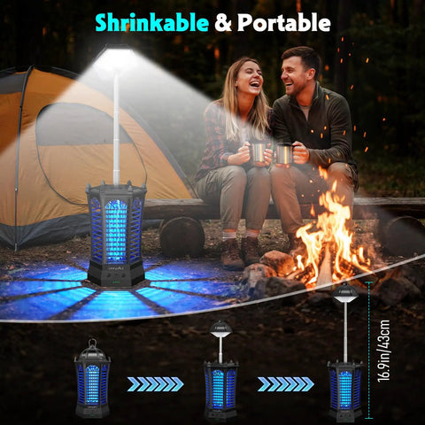 Outdoor And Indoor 3 In 1 4500V Mosquito Killer With Camping Light Cordless Rechargeable next to tent and campfire