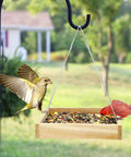 Eco Friendly Wood Hanging Bird Feeder Tray For Outdoors All Weather Durable Garden Wildlife Feeding Station in a garden setting