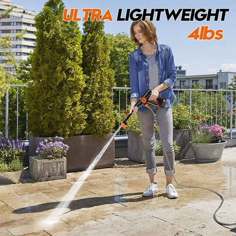 Person using Cordless Handheld Washer With Brushless Motor, 6000mAh Battery Operated Car Washer, Lightweight Water Washer on patio