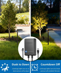 All In One Outdoor Landscape Lighting Kit With 60W Low Voltage Transformer illuminating garden pathway at dusk