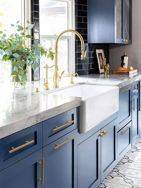 Modern kitchen with blue cabinets featuring 6 Inch T Shaped Bar Cabinet Pulls 8 Pack Stainless Steel Handles in gold finish.