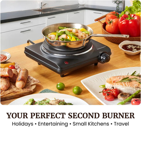 Roadready Electric Hot Plate Featuring Slick Cast Iron Cooking Surface Seven Speed Heat Dials Compact 1000 Watt Portable Burner in use
