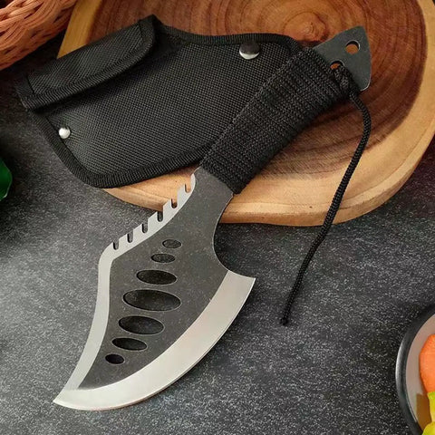 Beast Fixed Blade Axe Knife With Saw Back and Sheath, black handle, shown on cutting board, ideal for camping and survival
