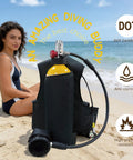 Compact 2L Scuba Tank Kit With Backpack And Regulator Hands Free Portable Dive Cylinder on beach next to seated woman
