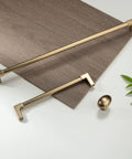 10 Pack Classic Solid Cabinet Handles Set 6.3 Inch Screw Spacing in Champagne Bronze with zinc alloy construction on wood surface