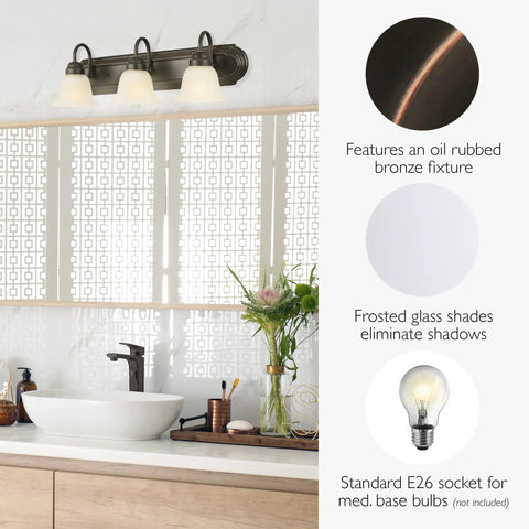 Three Light Dimmable Vanity Light In Oil Rubbed Bronze With Frosted Glass Shades, 24 Inch Wide in a modern bathroom setup.