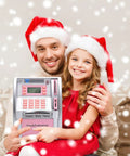 Child and adult with Dope ATM Piggy Bank For Real Money With Card Access And 4 Digit PIN Balance Checker celebrating Christmas.