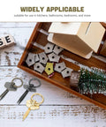 Vintage Style Retro Cabinet Drawer Pull Handles Set 15 Pieces shown with decorative wooden items