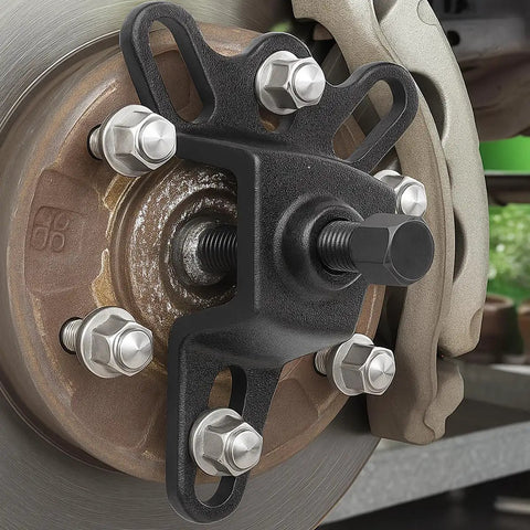 Front Hub Installer Puller Tool For Cars And Trucks, flange style axle remover for 3.75 to 4.50 inches, in use on vehicle hub