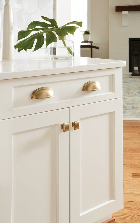 Golden Champagne Ashby Cabinet Cup Pull for 3 Inch Center To Center and 4 Inch Center To Center Spacing, installed on kitchen drawers