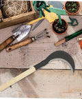 Long Handled Hand Scythe For Weeding In The Garden With Heavy Duty Manganese Steel Blade Japanese Style Garden Tool On Wooden Table