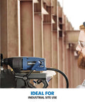 Evolution blue annular cutter magnetic drill in use on metal by worker wearing safety glasses
