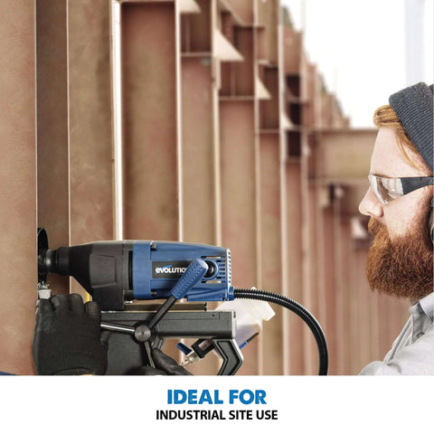 Evolution blue annular cutter magnetic drill in use on metal by worker wearing safety glasses