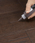Your Go To Floor Repair Putty In Dark Brown Fast Curing Acrylic Wood Filler For Laminate Vinyl application on floor.