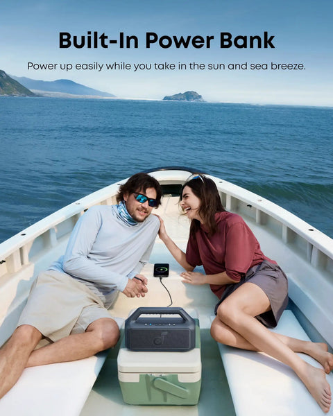 Couple in boat using Outdoor Bluetooth Speaker With Crankin Bass Subwoofer And BassUp 2.0 80W Power for camping and beach, IPX7 waterproof.