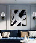 1 Light Wall Sconce With Plug In Cord And White Fabric Shade In Matte Black Finish on living room wall above sofa