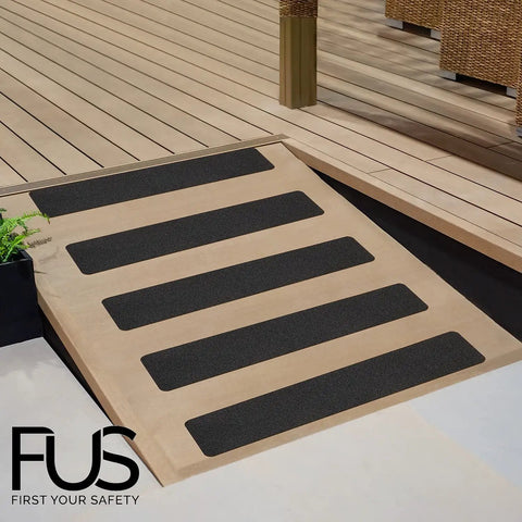 No Slip Stair Treads With 80 Grit PET Non Skid Tape showing traction strips on outdoor wood ramp for stairs with roller