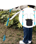 Person using Backpack Spreader Sprayer For Granular Fertilizer And Manure, Handy Metal Double Handle, Adjustable Knob in garden