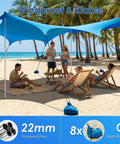 Big 14x11 Foot Beach Shade Shelter With UPF50 Protection, Easy Setup Canopy with sandbags and poles on sunny beach
