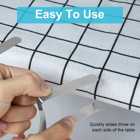 Hands using Heavy Duty Stainless Steel Tablecloth Clips 16 Pack For Outdoor Tables Stay Put No Slip Metal Picnic Table Clips on grid cloth